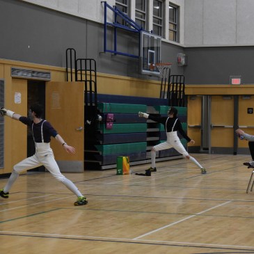 epee fencers lunge to hit the target